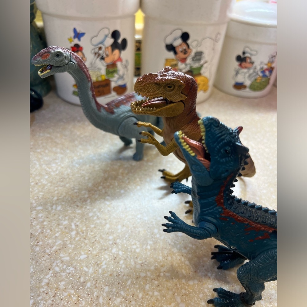3 Kid Galaxy Posable Dinosaurs with Light up eyes and sounds